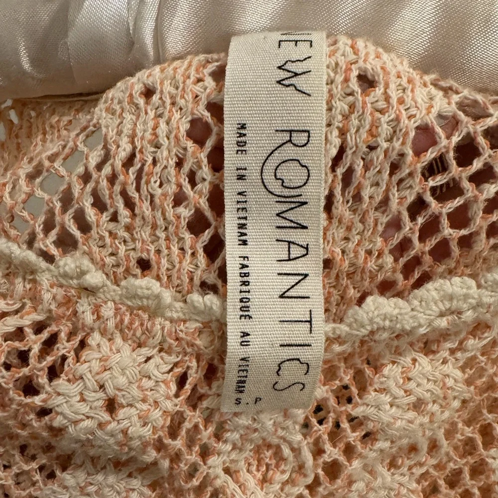 Lace pink and cream Free People crochet trim cropped long sleeve sweater